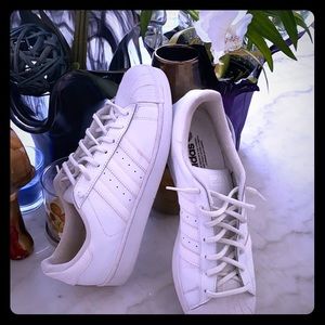 Leather white adidas has been worn before.